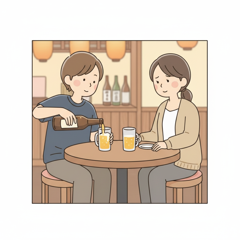 居酒屋のテーブルで一人がビールを自分のグラスに注いでおり、もう一人が少し気まずそうな顔で見ている